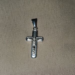 NWOT Sterling silver crucifix pendant.